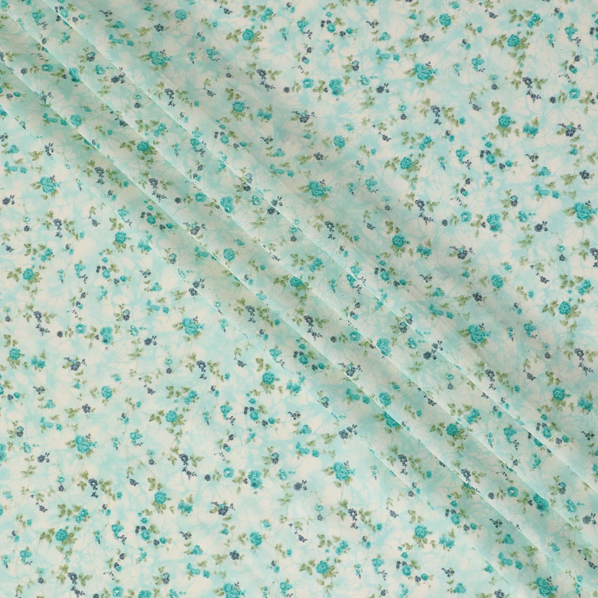 Light sea green cotton voile fabric with cream and turquoise green print in floral design-D16414